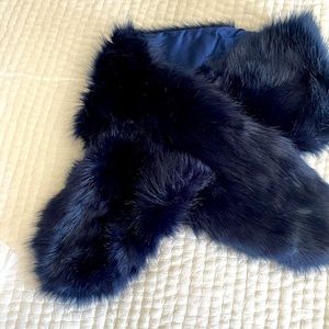 Navy blue faux fur wrap. 60 inches long.